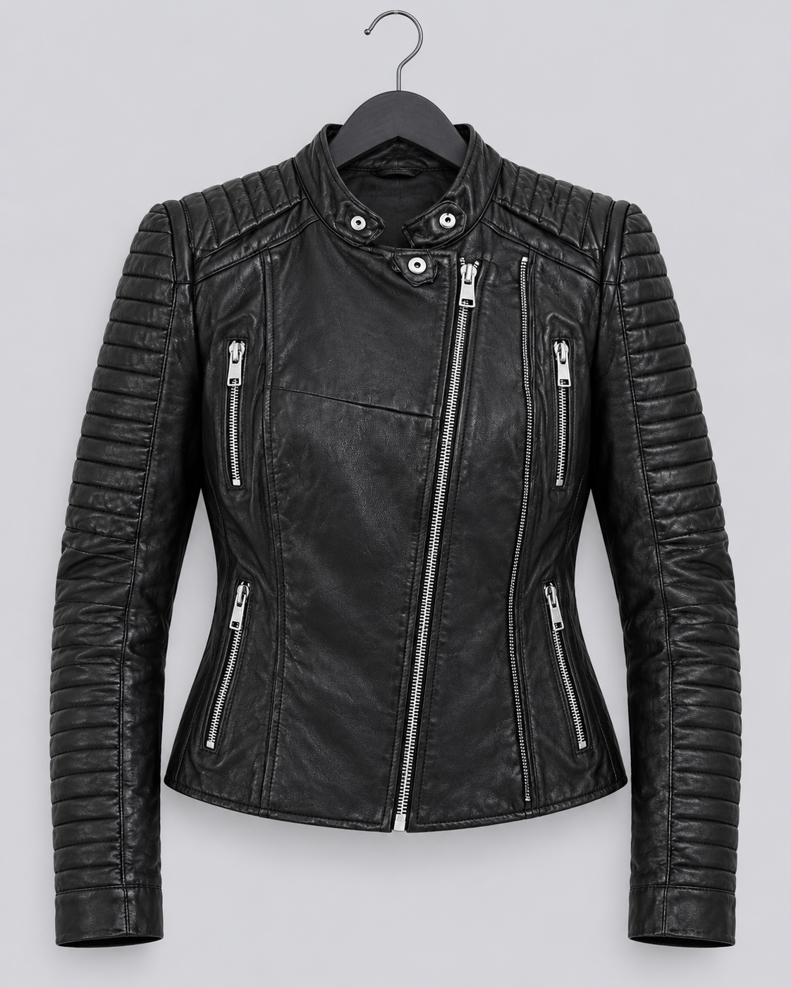 Black faux leather motorcycle jacket with quilted sleeve panels, a stand collar, and silver zippers, shown on a black hanger against a light gray background.